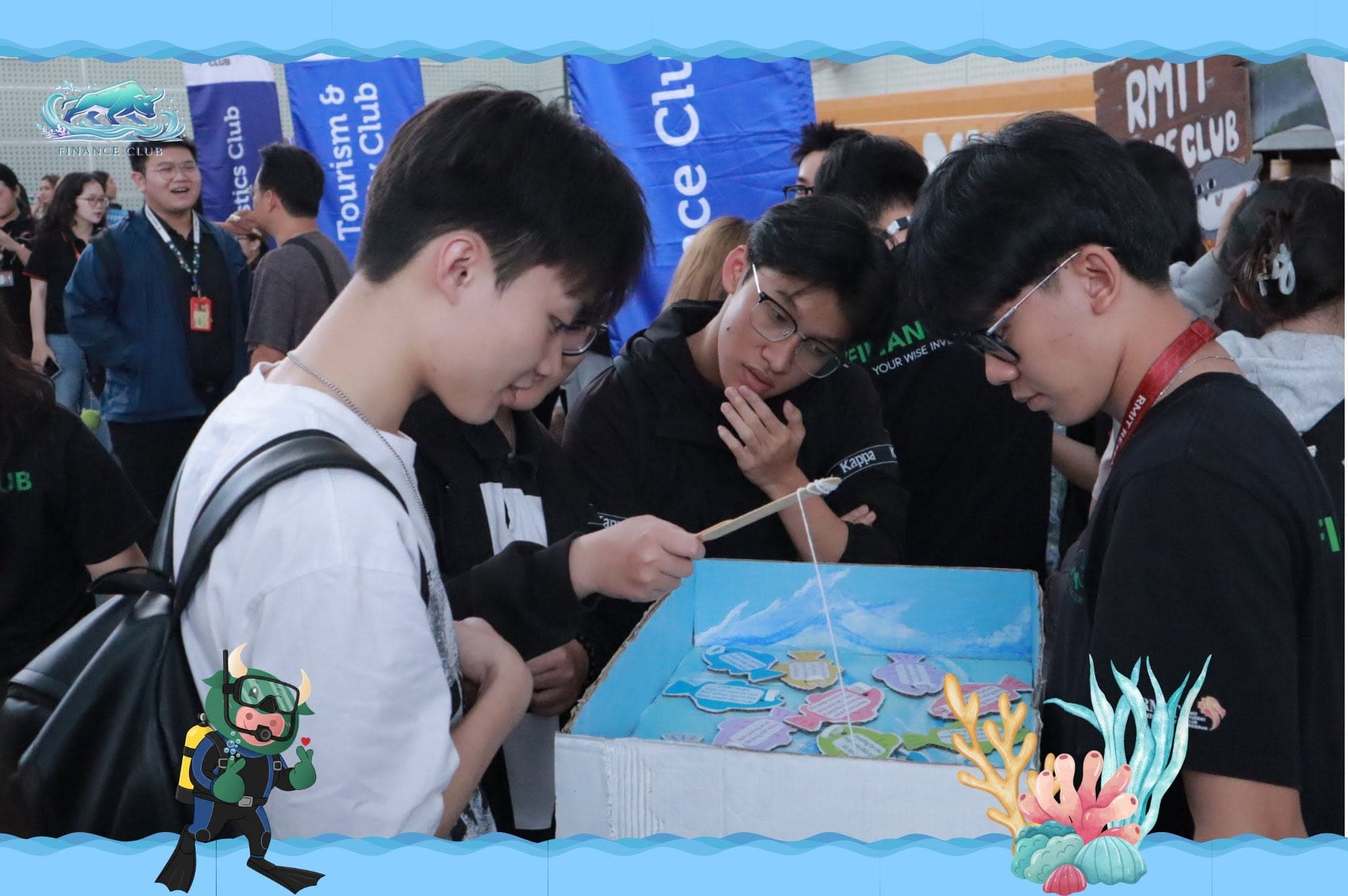 Students joining a hands-on activity at the club booth.